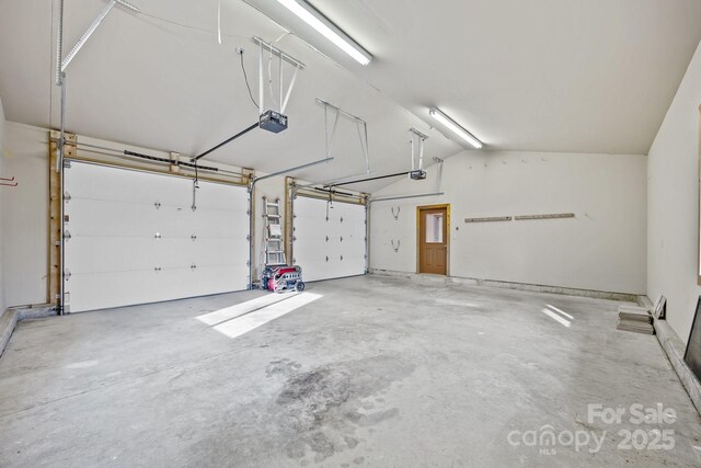 417 Quiet Forest Ln, Sylva, NC 28779 - garage featuring a garage door opener