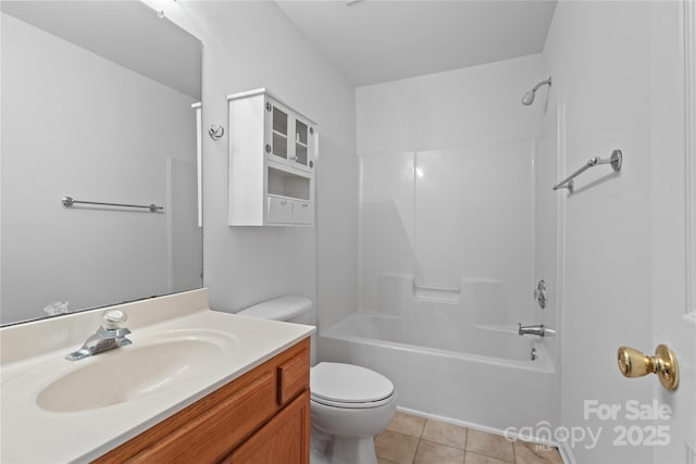 full bathroom featuring shower / bathing tub combination, vanity, tile patterned floors, and toilet