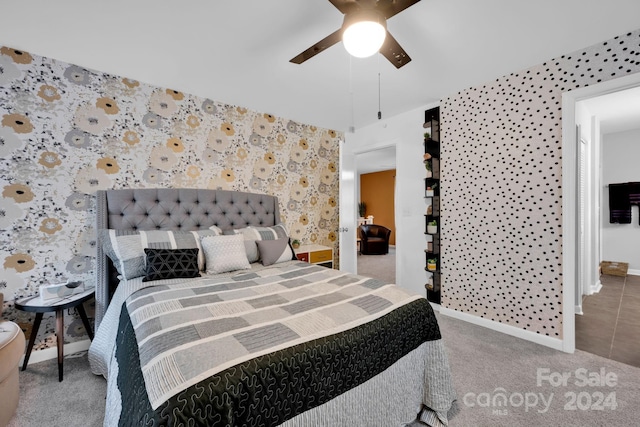 carpeted bedroom featuring ceiling fan