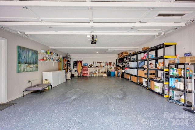 garage featuring a garage door opener