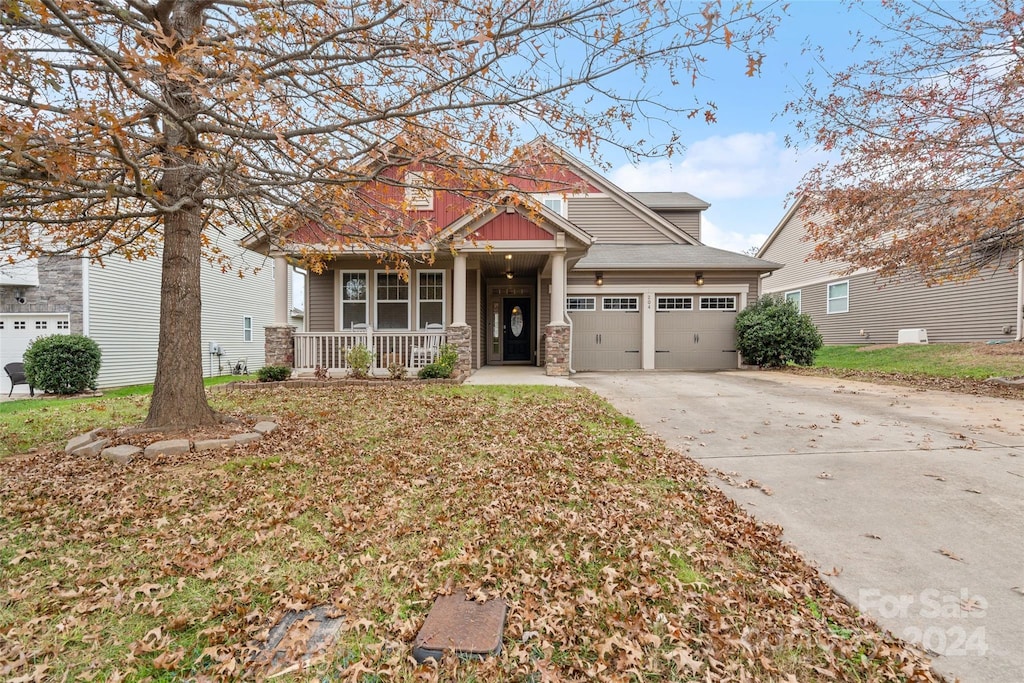 craftsman-style home with covered porch