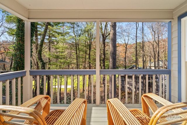 unfurnished sunroom featuring a healthy amount of sunlight