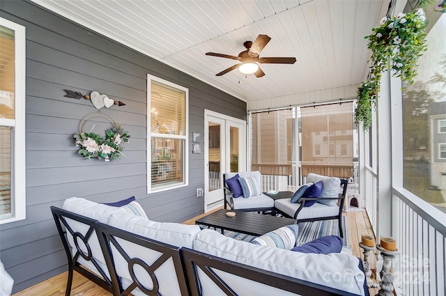 sunroom with ceiling fan