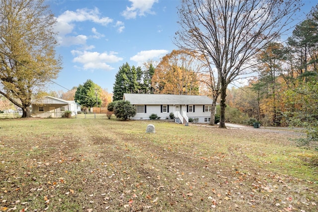 view of front of property with a front lawn