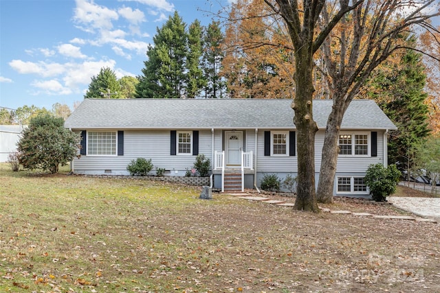 single story home with a front lawn