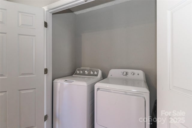 laundry area featuring separate washer and dryer