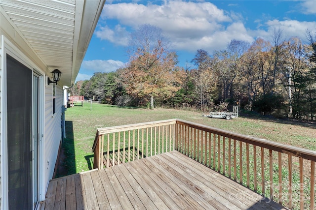 deck featuring a yard