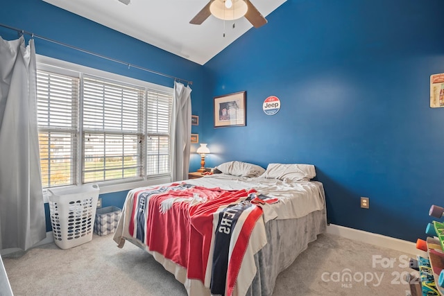 bedroom featuring ceiling fan, light colored carpet, and lofted ceiling