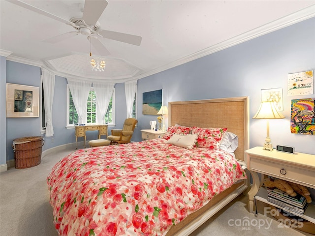 carpeted bedroom with ceiling fan and ornamental molding