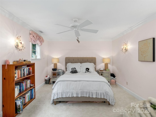 bedroom with ceiling fan, light carpet, and crown molding