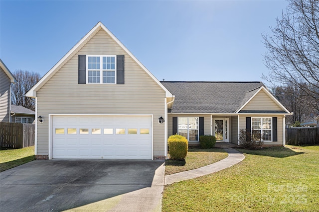 traditional-style house featuring a front yard, fence, a shingled roof, concrete driveway, and a garage