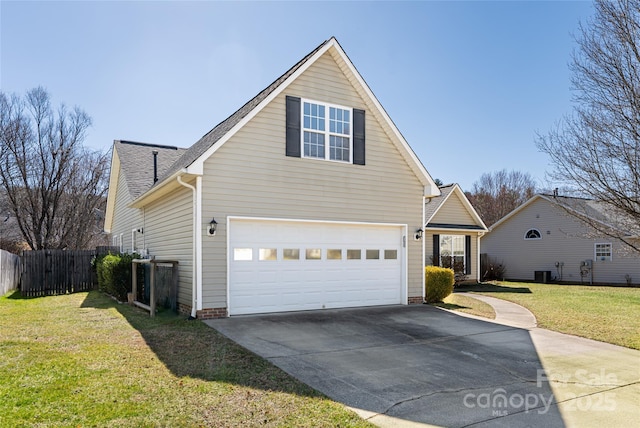 view of side of home featuring fence, central AC, concrete driveway, a garage, and a lawn