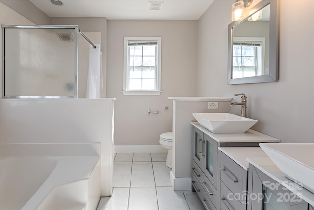 full bathroom with visible vents, an enclosed shower, toilet, baseboards, and vanity