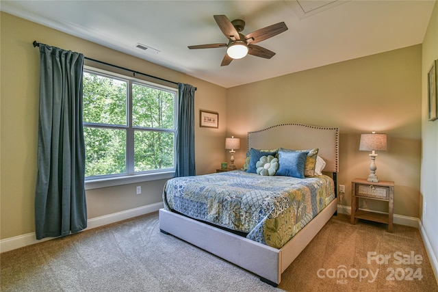 carpeted bedroom featuring ceiling fan