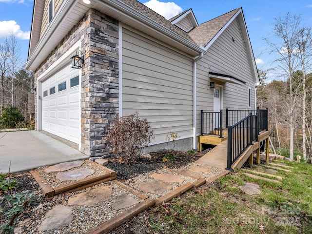 view of home's exterior with a garage