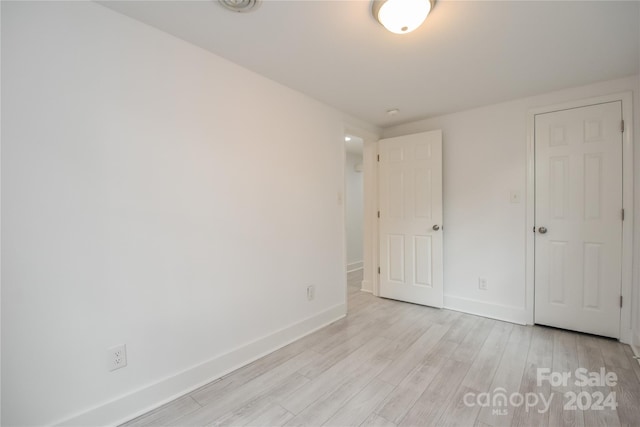 unfurnished bedroom featuring light hardwood / wood-style flooring