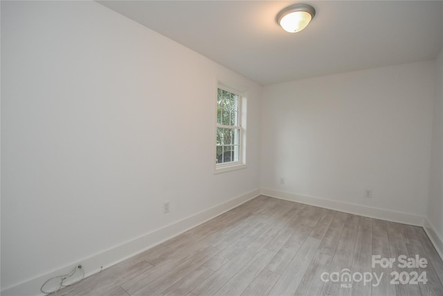 empty room with light wood-type flooring