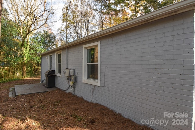 view of property exterior featuring a patio