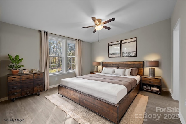 bedroom featuring ceiling fan and light wood-type flooring