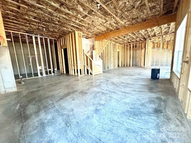 misc room with concrete floors