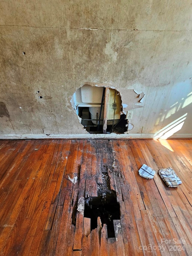 interior details featuring wood-type flooring