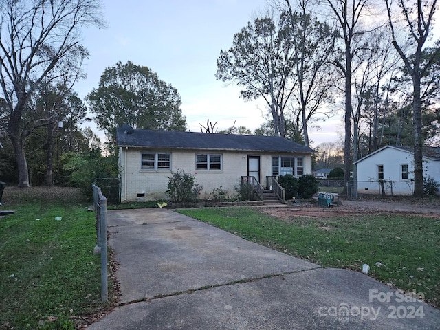 view of front of home with a front yard