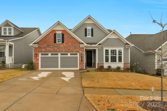 craftsman house with a garage