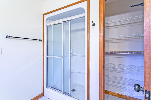 bathroom with a stall shower