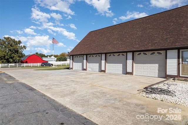 garage featuring fence