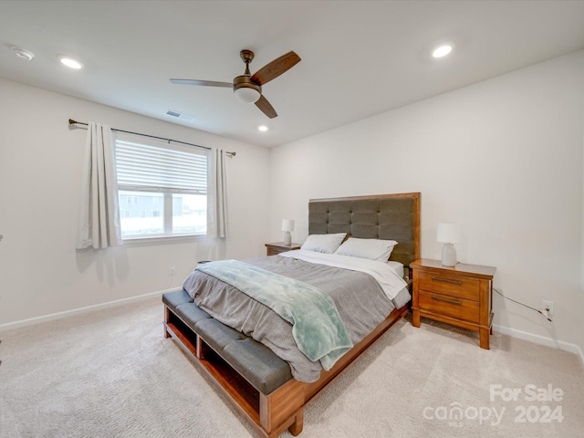 carpeted bedroom featuring ceiling fan