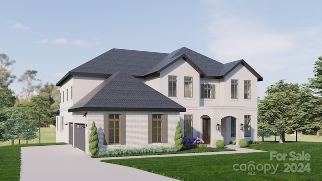 view of front of house featuring a front lawn, covered porch, and a garage