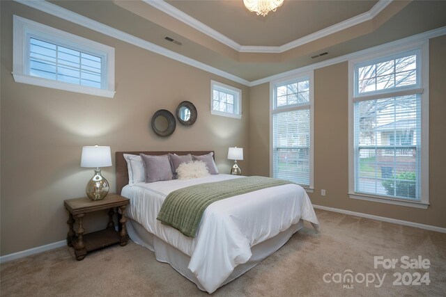 carpeted bedroom featuring ornamental molding