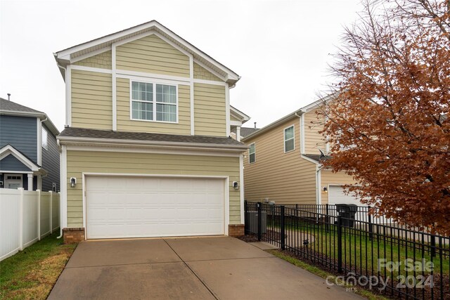 front of property featuring a garage