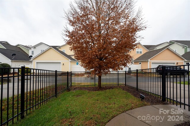 view of yard with a garage