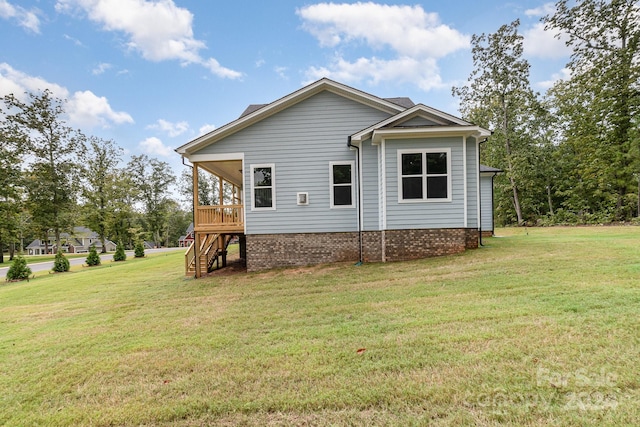 exterior space with a yard