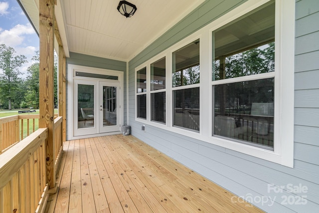 wooden terrace featuring french doors