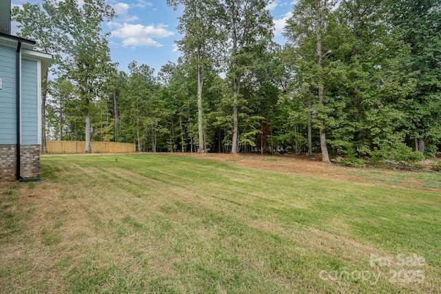 view of yard featuring fence