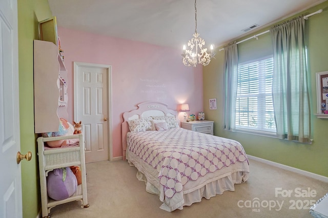 bedroom featuring light carpet and a notable chandelier