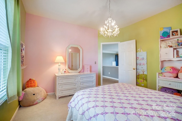 carpeted bedroom with an inviting chandelier