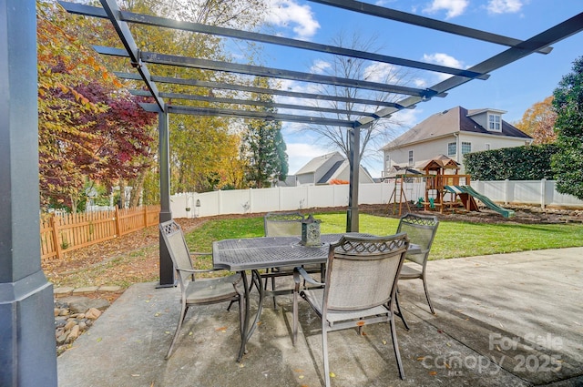 view of patio / terrace with a pergola and a playground