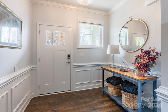 entryway featuring dark hardwood / wood-style flooring and ornamental molding