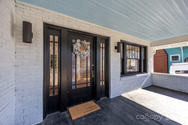 entrance to property with covered porch