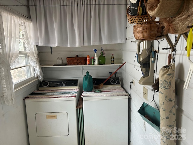 laundry room featuring washing machine and dryer