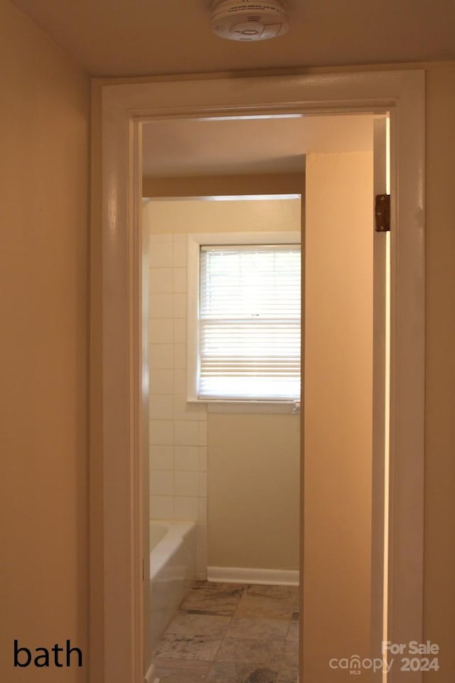 bathroom featuring a bathing tub