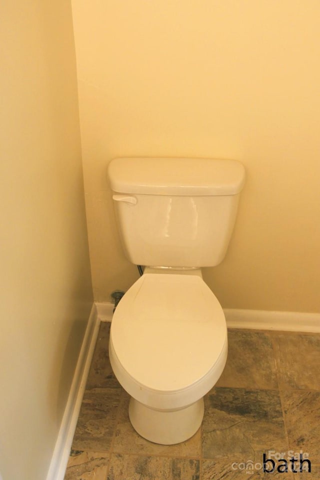 bathroom featuring toilet