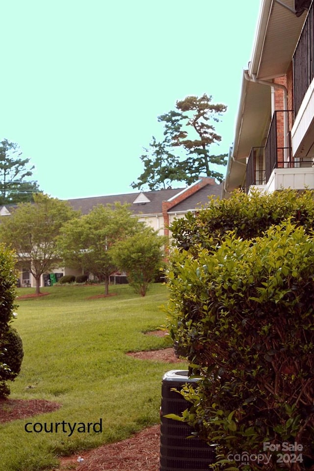 view of yard featuring cooling unit