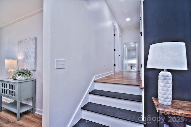 stairway with wood-type flooring