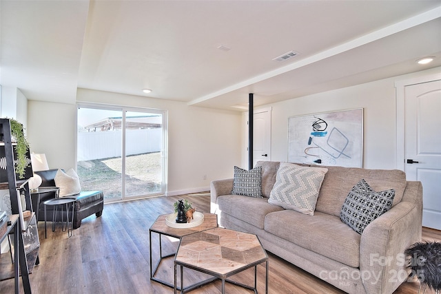 living room with wood-type flooring