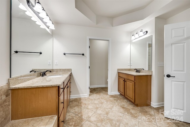 bathroom with vanity and tile patterned floors