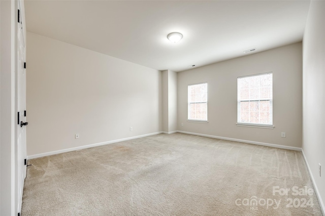 view of carpeted spare room